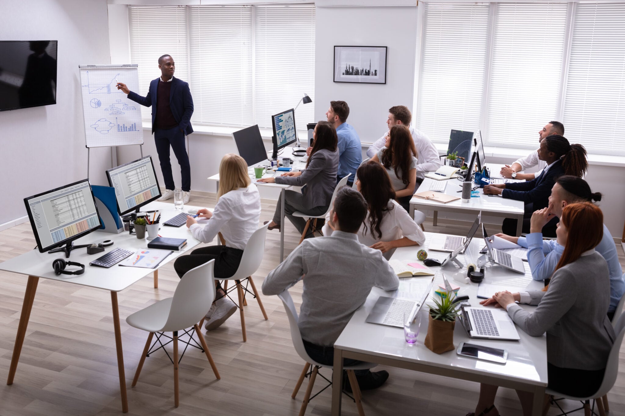 Professionals participating in an instructor-led readiness session